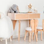 chairs-with-bunny-ears-children-room-table-with-toys-big-sheep-min