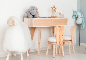 chairs-with-bunny-ears-children-room-table-with-toys-big-sheep-min